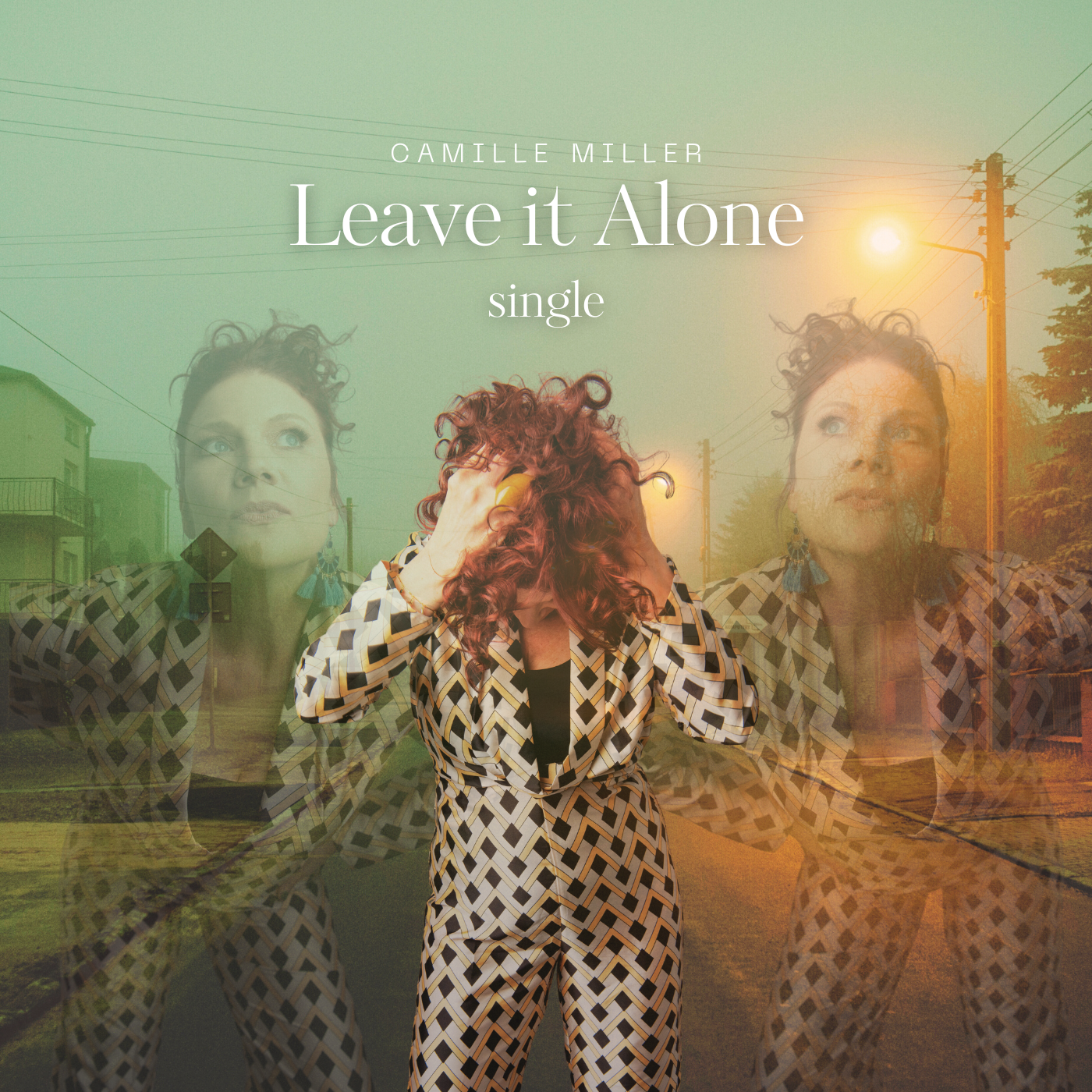 The single for Camille Miller's single Leave it Alone featuring a picture of Camille in front of a street backdrop.